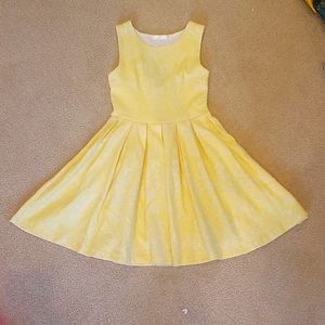 Gorgeous yellow dress, with heart shaped open back